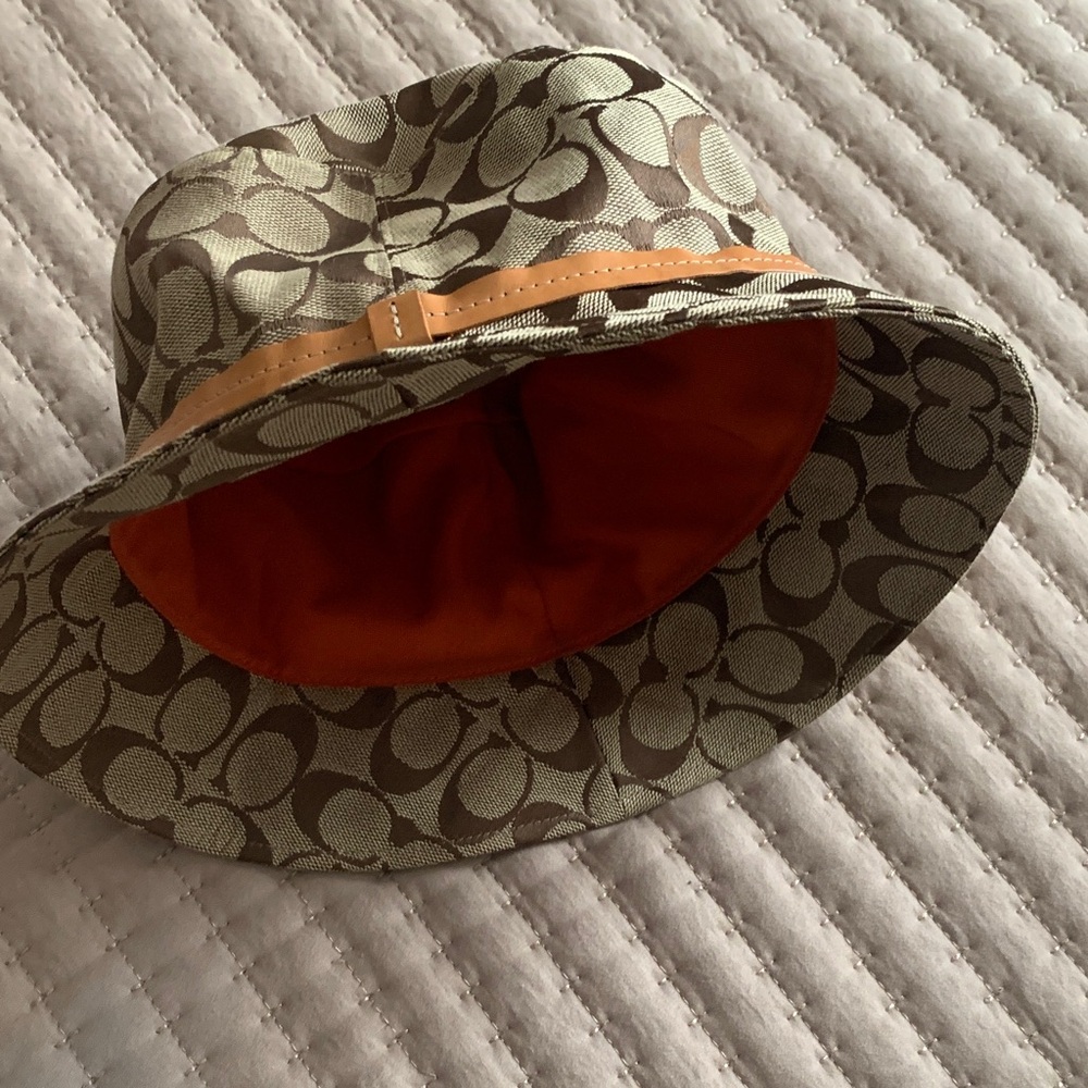 Coach Signature Pattern Bucket Hat with Orange Lining